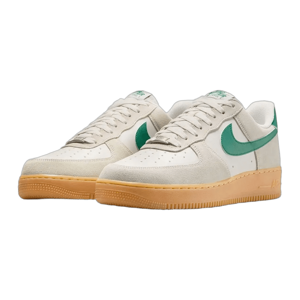 Pair of Nike Air Force 1 '07 LV8 shoes in light grey and white with green Swooshes and gum soles