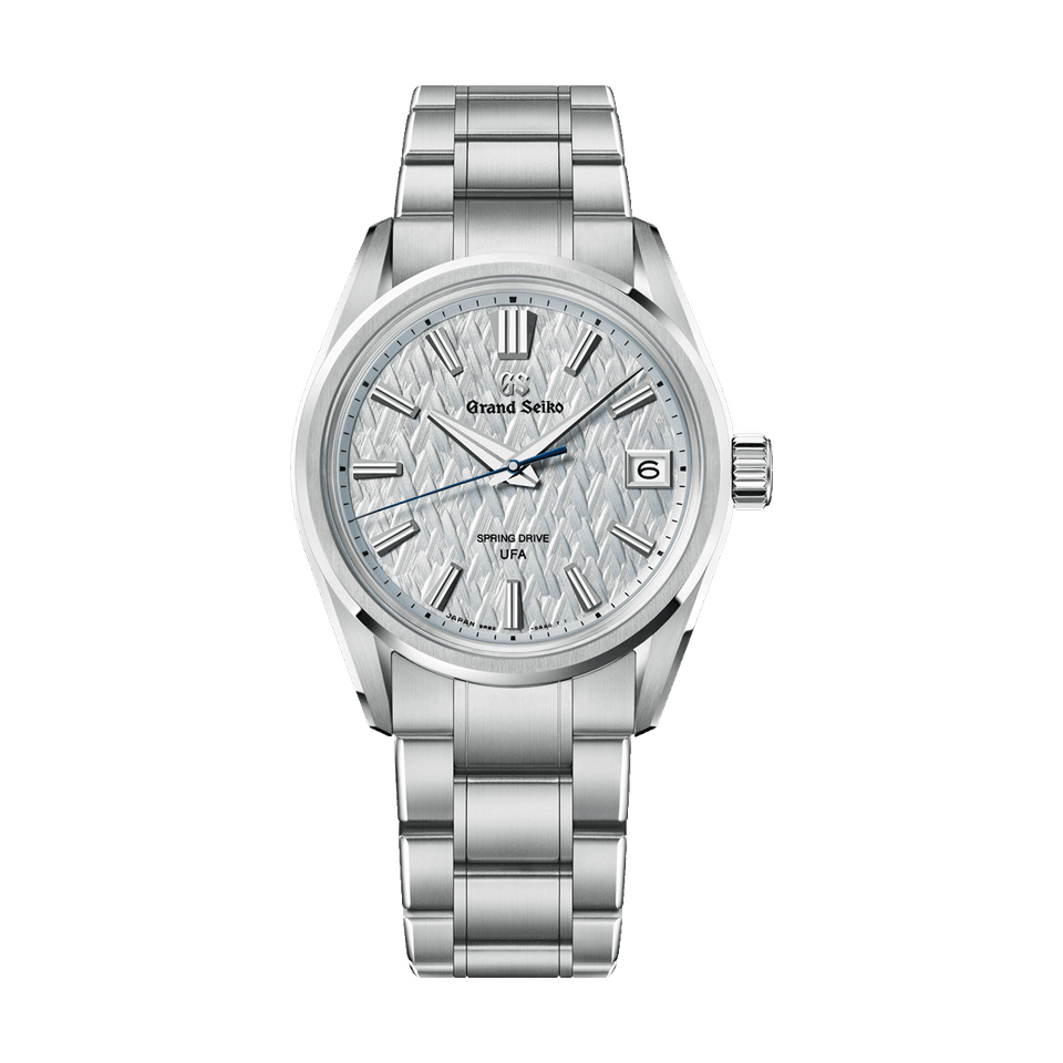 Grand Seiko Evolution 9 Spring Drive U.F.A. watch with a silver ice-forest dial and titanium bracelet