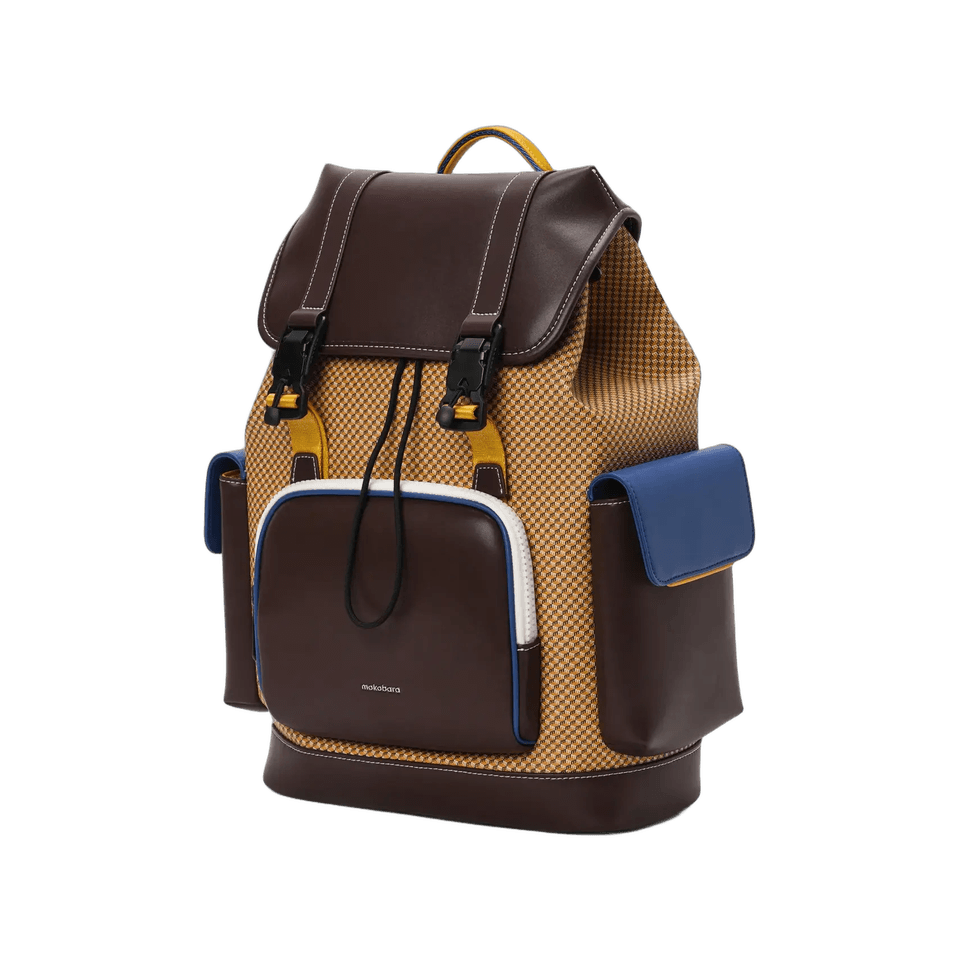 Brown and mustard Mokobara Teriyaki Backpack with blue accents on a white background.